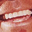 detail of a smile from https://commons.wikimedia.org/wiki/File:Chief_Sielu_in_2015.jpg